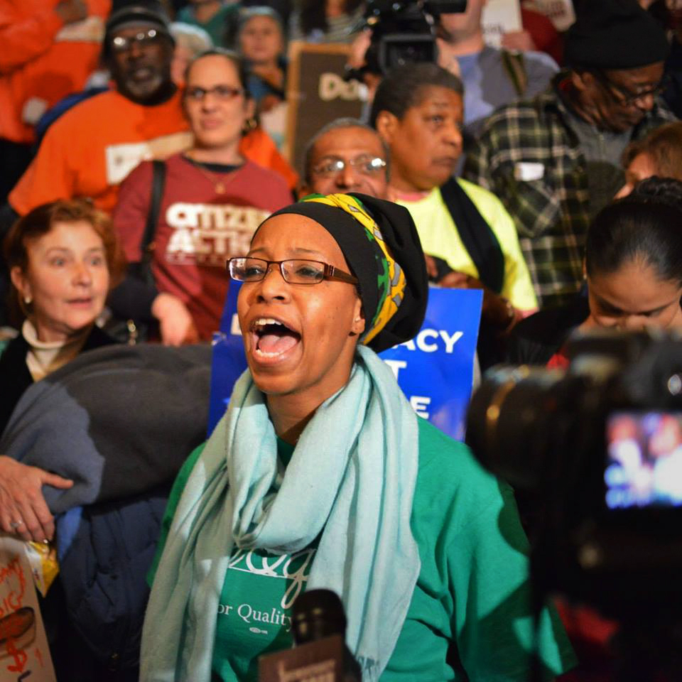 A photo of Zakiyah Ansari speaking out at a rally in Albany, New York, organized to demand the equitable funding of public schools in the state.