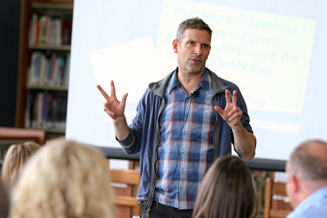 A photo of Paul Gorski leading a workshop on race, poverty, and educational equity.